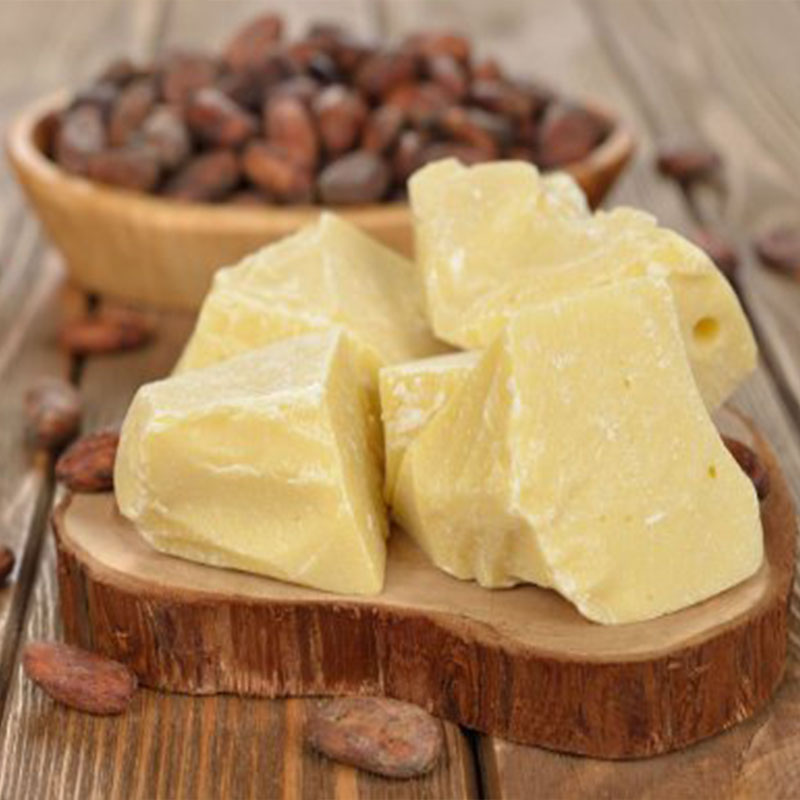 picture of cocoa butter on a wooden table