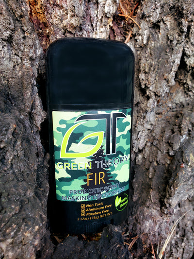 Fir probiotic scent masking deodorant front packaging in bark of tree