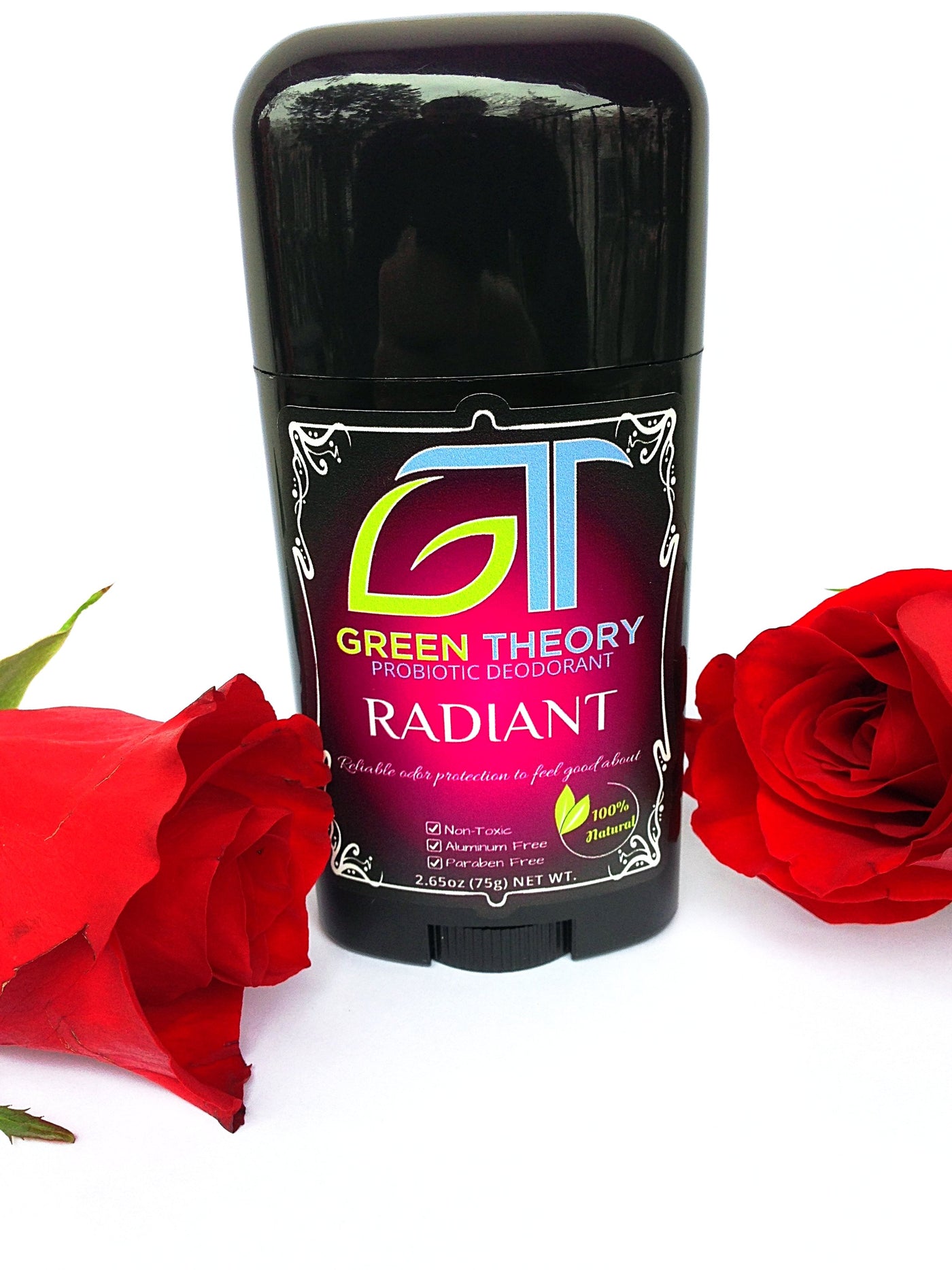 photo of greent theory radiant probiotic aluminum free natural deodorant against a pure white background with roses laid at the sides of the stick
