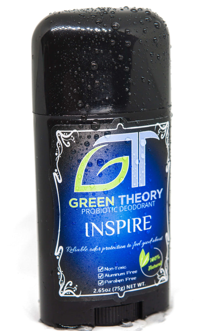 Inspire probiotic natural aluminum free deodorant for womens at an angle with water droplets covering the container