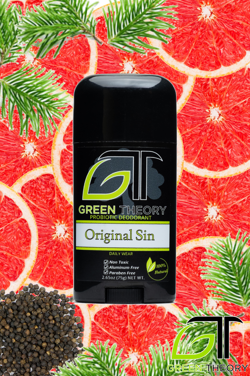 image of green theory probiotic deodorant for men superimposed over pink grapefruit slices, black pepper and fir needle to depict scent