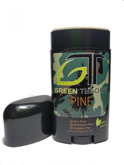 image with green theory pine deodorant and cap off. cammouflage label with green theory logo