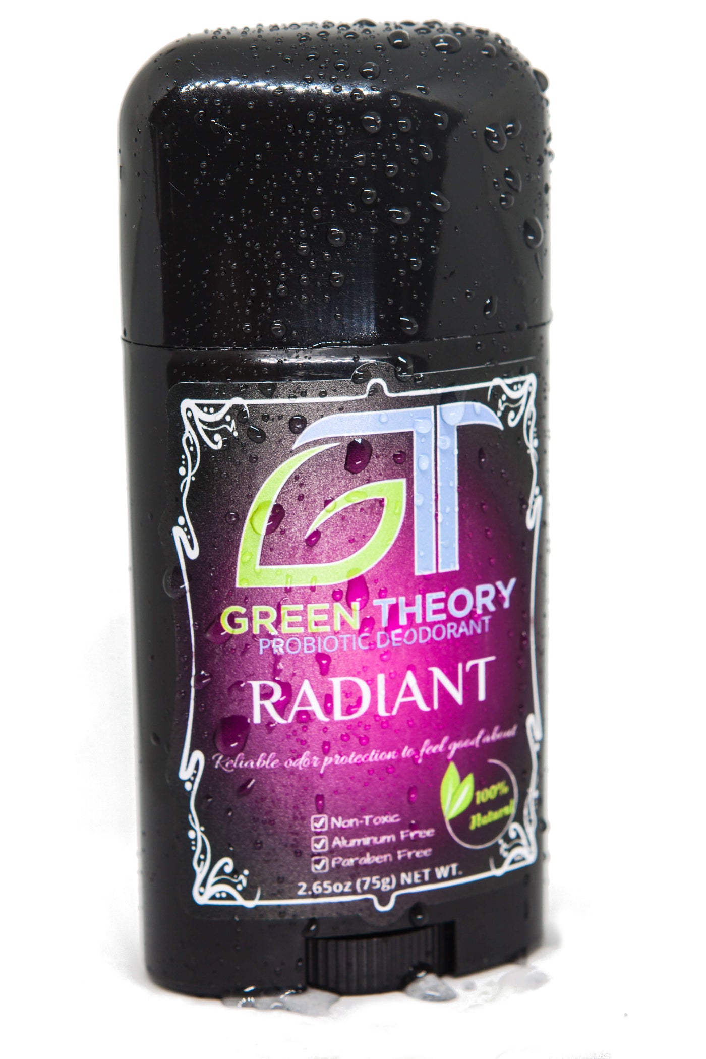 green theory radiant probiotic natural deodorant for women with an angular view of the front label. Stick is covered in water droplets and is standing against a white background