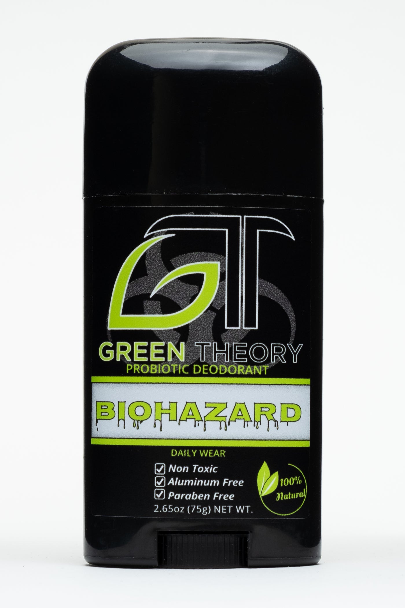 photo of Green Theory Biohazard probiotic deodorant front. Product is standing against a black background. It comes in a shiny black plastic container. Front label features a large GT stylized logo with the G in the shape of a leaf. The logo is imposed over a biohazard symbol. Product name is written in a dripping font and lists "non toxic", Aluminum free" and "paraben free" as its freatures