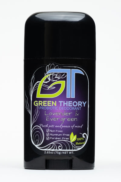 photo of Green Theory Lavender & Evergreen all natural, probiotic aluminum free deodorant for women. The stick is standing upright against a pure white background. The container is a sleek black plastic. The front label features a large GT Green Theory logo witht he G in the shape of a leaf. Under the logo is "Lavender & Evergreen" and "fresh pits and peace of mind" with "non toxic", "aluminum free" and "paraben free" listed as benefits.