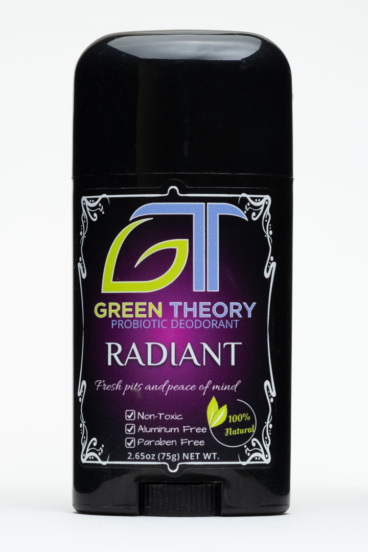 front photo of Green Theory Radiant probiotic aluminum free natural deodorant for women. Stick is a sleek black plastic and is standind aginst a white background. Front label is a deep rose colored orb with a stylized frame around the border. At the top of the label is a stylized GT logo with the G being in the shape of a leaf. Under is "Radiant" with "fresh pits and peace of mind" written below and "non toxic", "aluminum free" and "paraben free" listed as priduct benefits